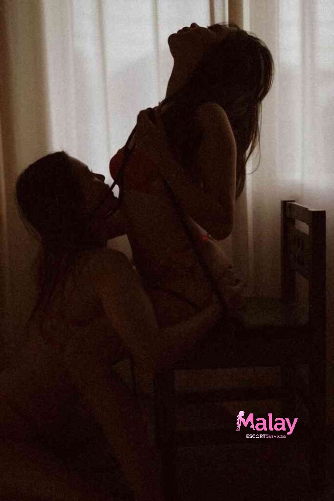 Malay Escort Service Silhouetted couple in intimate moment near window KL Escort Girl Malay Escort KL Real KL Escorts Ready for You Malay Escort Service Silhouetted couple in intimate moment near window KL Escort Girl