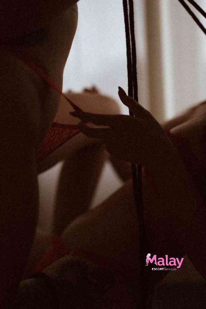 Malay Escort Service Closeup of a hand gently pulling on red lace lingerie KL Escort Girl Malay Escort KL Real KL Escorts Ready for You Malay Escort Service Close up of a hand gently pulling on red lace lingerie KL Escort Girl