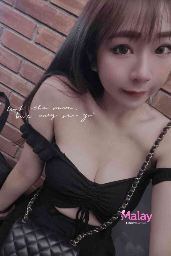 Malay Escort Service Young woman in a black dress with text I look at the moon but only see you KL Escort Girl Malay Escort KL Real KL Escorts Ready for You Malay Escort Service Young woman in a black dress with text I look at the moon but only see you KL Escort Girl
