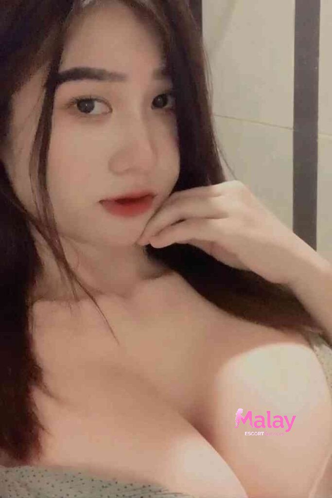 Malay Escort Service Closeup portrait of a young woman with long dark hair fair skin and dark eyes wearing a strapless top KL Escort Girl Malay Escort KL Real KL Escorts Ready for You Malay Escort Service Close up portrait of a young woman with long dark hair fair skin and dark eyes wearing a strapless top KL Escort Girl
